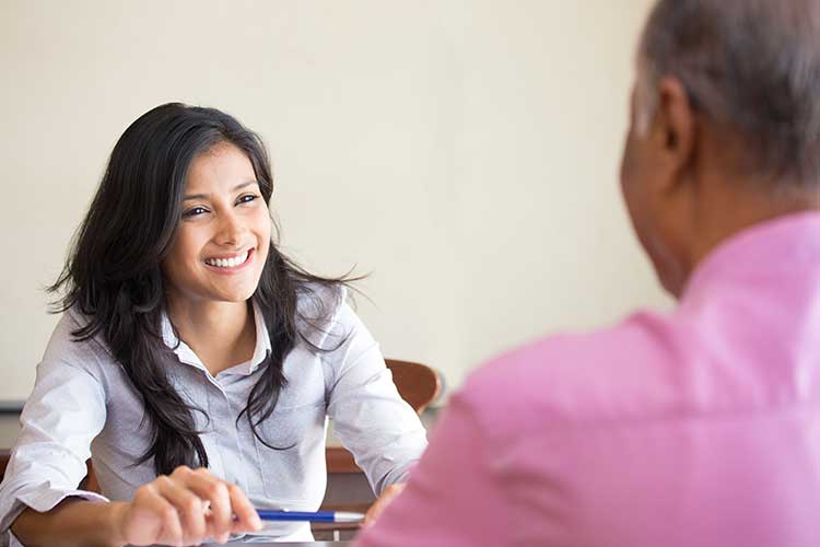 ndis quality management carer interviewing client for feedback