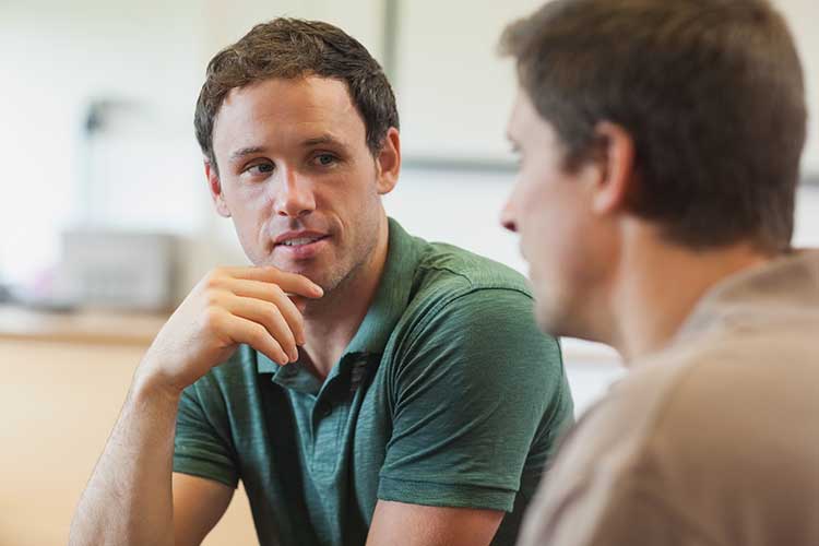 nurse-led education two men discussing men's health