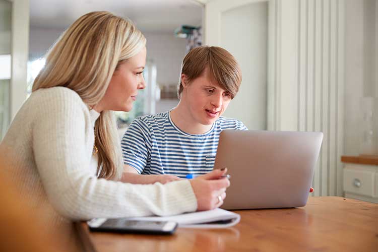 participant and mother choosing new provider on laptop