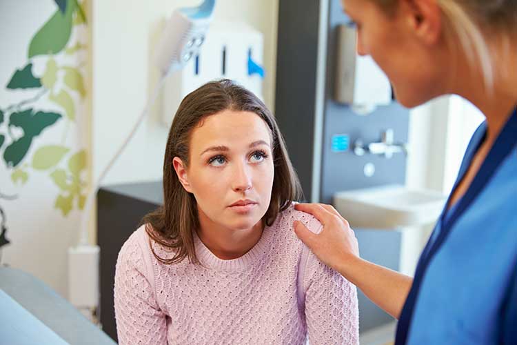 nurse comforting patient de-escalation