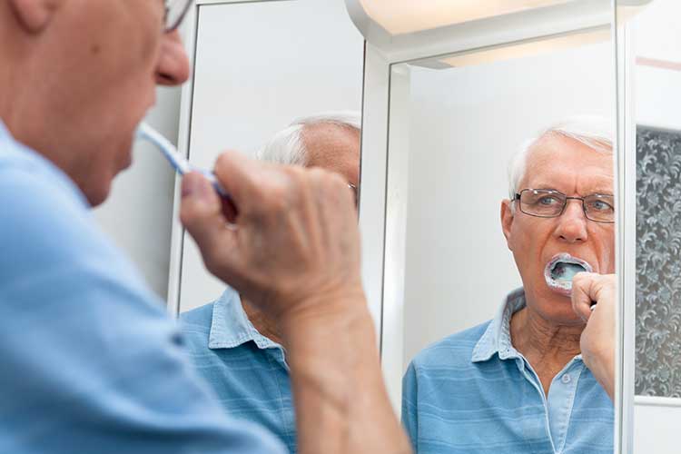 qi program activities of daily living resident brushing teeth