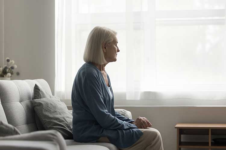 forgotten australians sad woman sitting alone