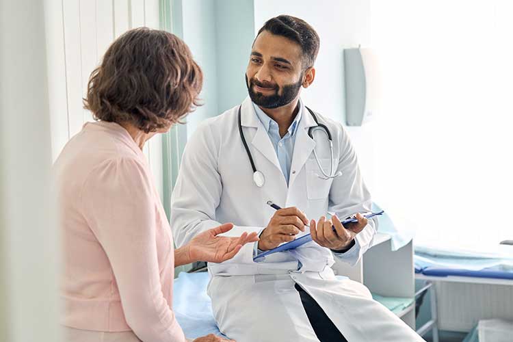partnering with consumers doctor discussing with patient